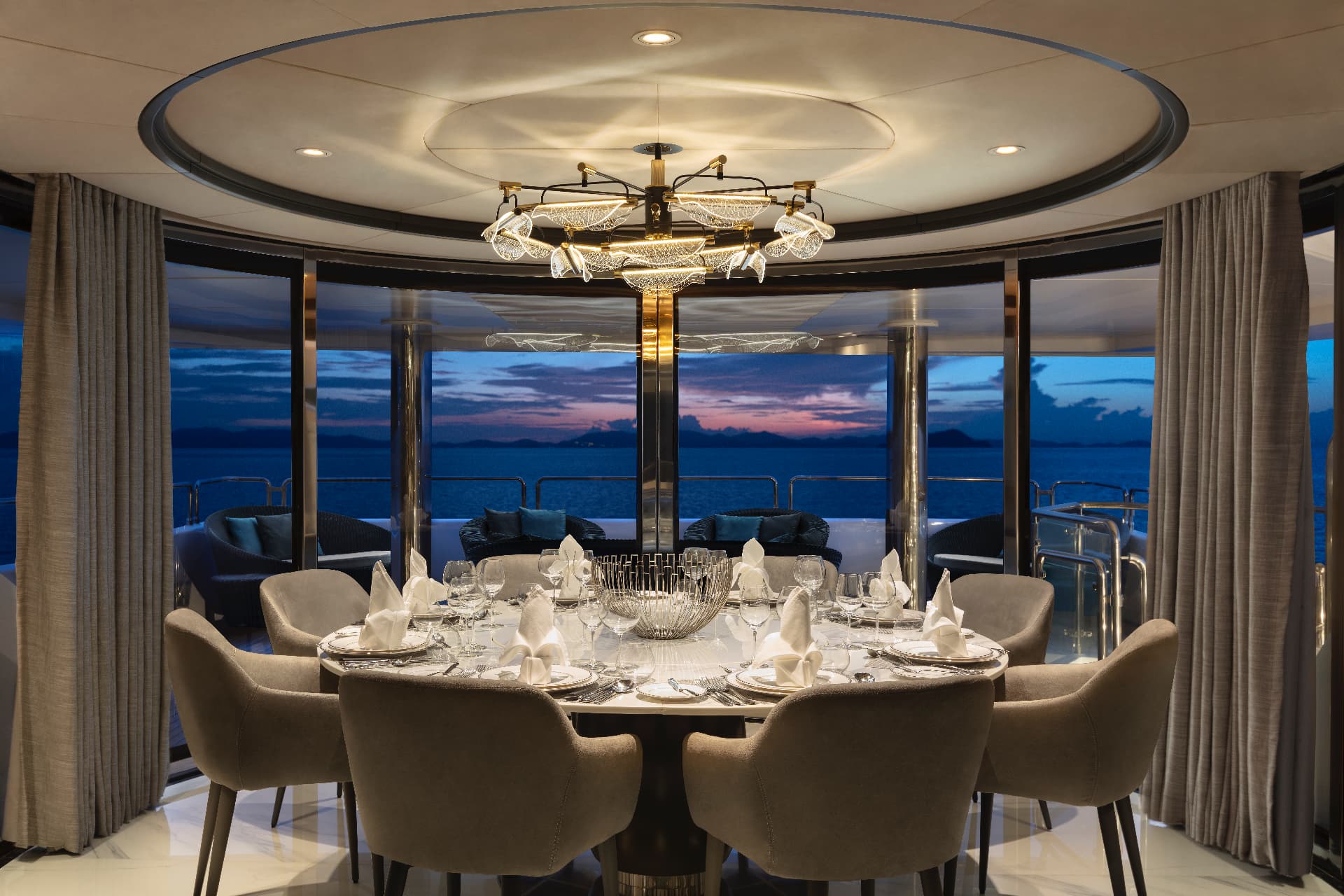 Sky lounge dining area aboard the Astondoa 150 superyacht in Phuket