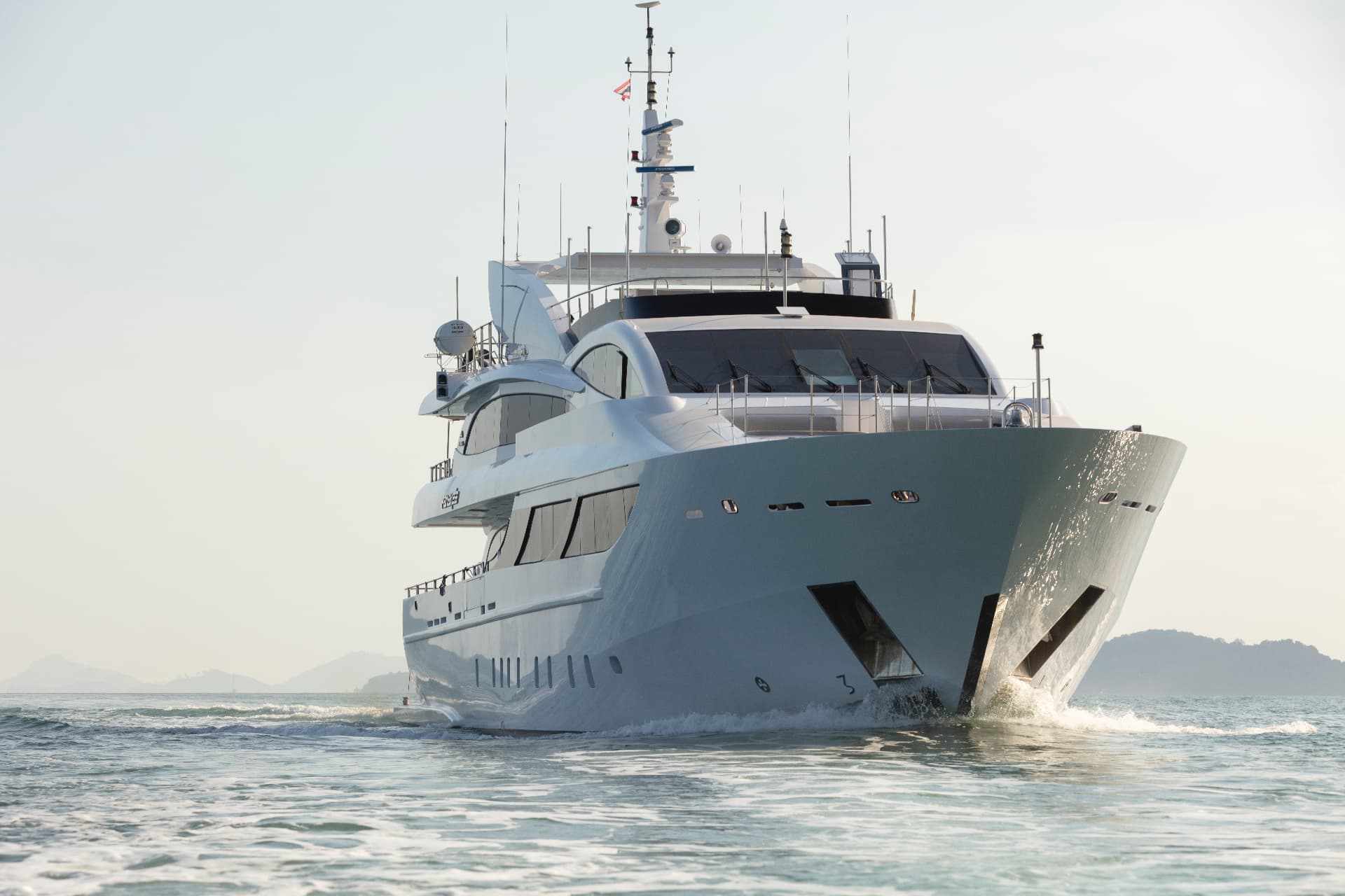 Astondoa 150 superyacht bow cutting through the Andaman Sea